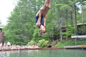 diving in cool mountain spring water at summer camp