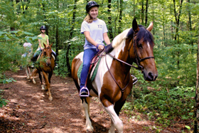 riding horses at illahee summer camp  for girls