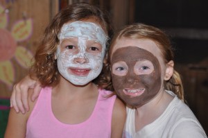 Campers enjoy a spa facial during cabin adventure at summer camp.