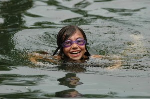 Girls camper swimming at Camp Illahee for Girls