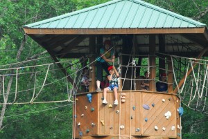 High ropes course, Beanstalk climbing tower and zipline at Camp Illahee girls camp.