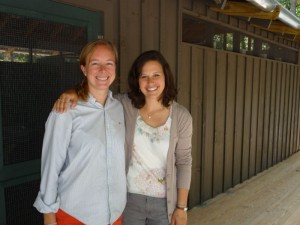 Assistant Director Kris Campbell shows staff alum Elizabeth Eiland the new Heigh Ho bath house.