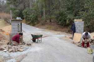 Rock masons work on new entry for Camp Illahee Girls Camp.