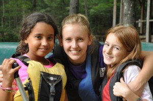 Summer camp canoeing buddies take a moment to pose for the camera