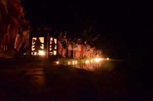 Hillbrook summer campers float wish boats on the final night of camp.