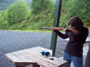 Kelly shoots at targets while in Alaska