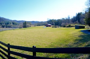 The barn at Hannah Ford farm is visible behind the fence.