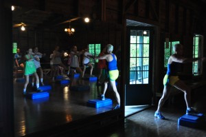 Molly Christman, a twenty year Illahee "girl," leads the girls in step aerobics.