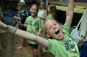 Camper enthusiastically prepares for airband at Camp Illahee