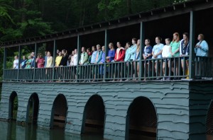 Illahee counselors sing from the porch