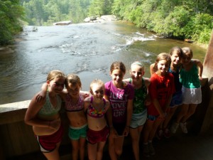 Illahee girls enjoy the view from a covered bridge