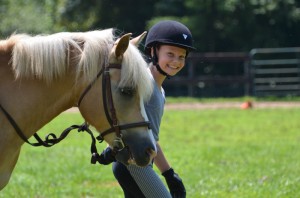 Illahee camper leading her horse