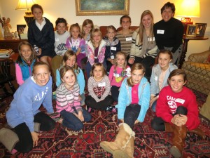 showing Group shot of Camp Illahee campers with director Laurie Strayhorn.