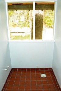 Interior of Heigh Ho cabin bathroom after installation of tile and easy clean wall coverings.