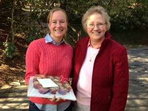 Ms Davis and Kris hold Valenitine muffins.