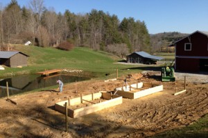 Two of four raised garden beds take shape at Camp Illahee's farm.