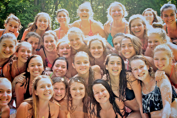 A group of Sparks pose on the Slip n Slide.