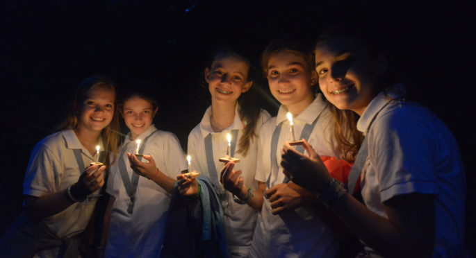 a cabin pauses to reflect on their wish on summer camp's final night