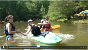 Camper practices her roll on Illahee's Canoe Lake